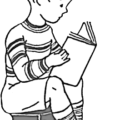 boy reading on block free clipart